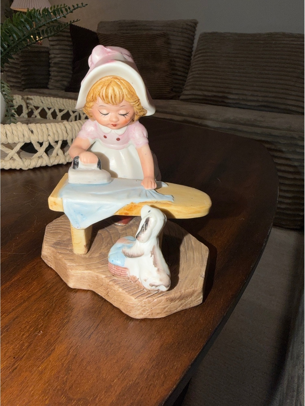 Girl Ironing with Goose Figurine